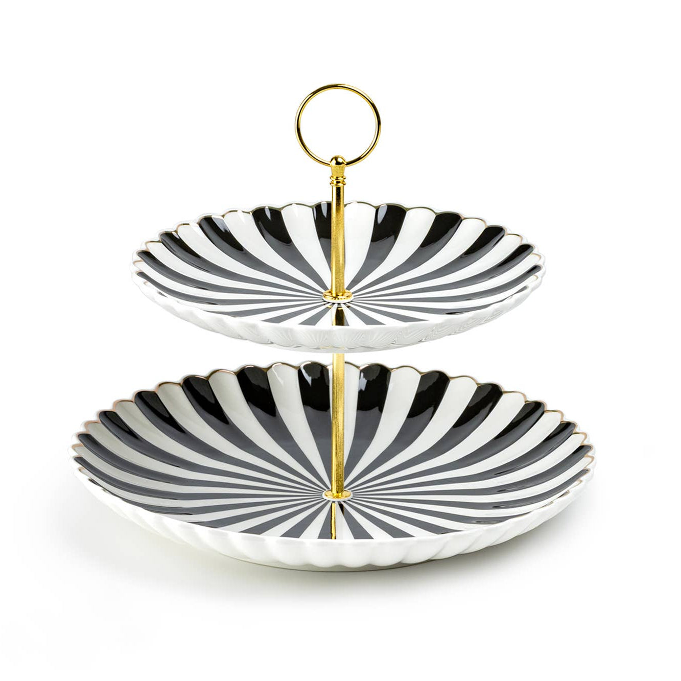 A two-tier ceramic serving tray with a black and white radial striped pattern and a gold-finished central pole and top ring handle, shown on a plain white background.