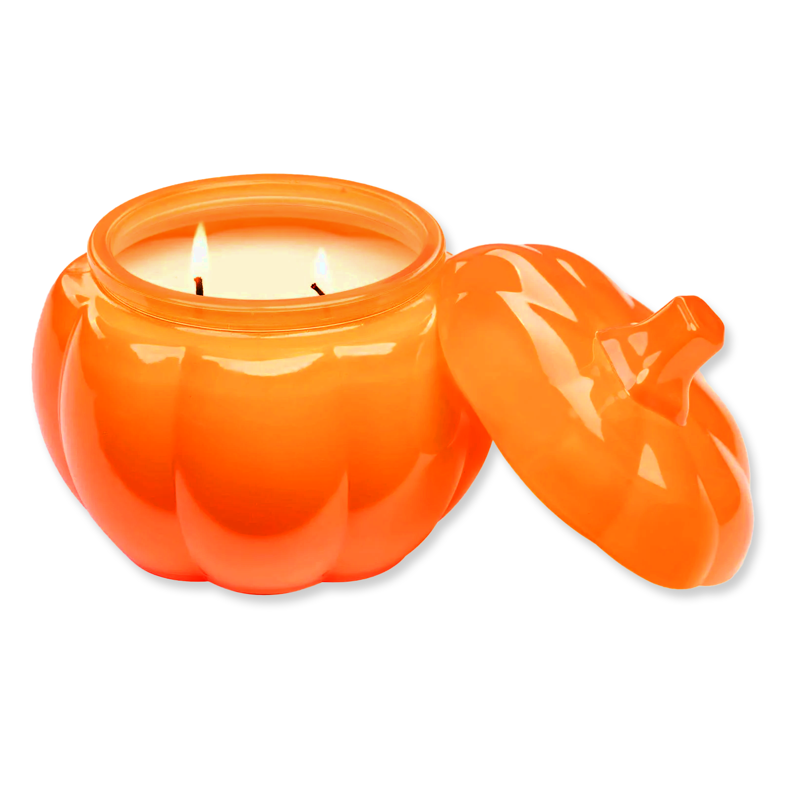 Orange pumpkin-shaped candle with a lit wick on a white background