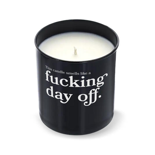 Candle in a black container with text on a white background