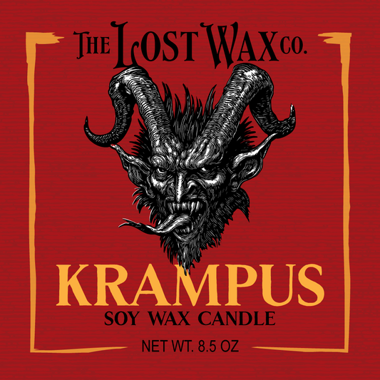 Label for 'Krampus' soy wax candle from The Lost Wax Co. on a red background with a black and white illustration of Krampus.