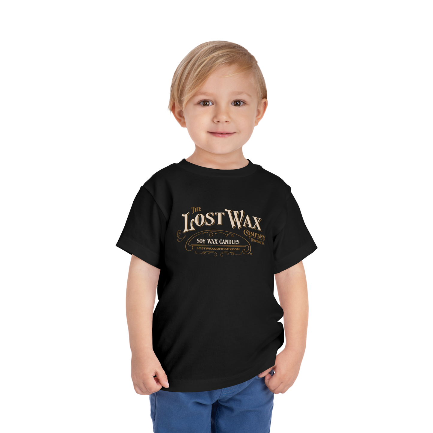 Child wearing a black t-shirt with 'The Lost Wax' logo on a white background