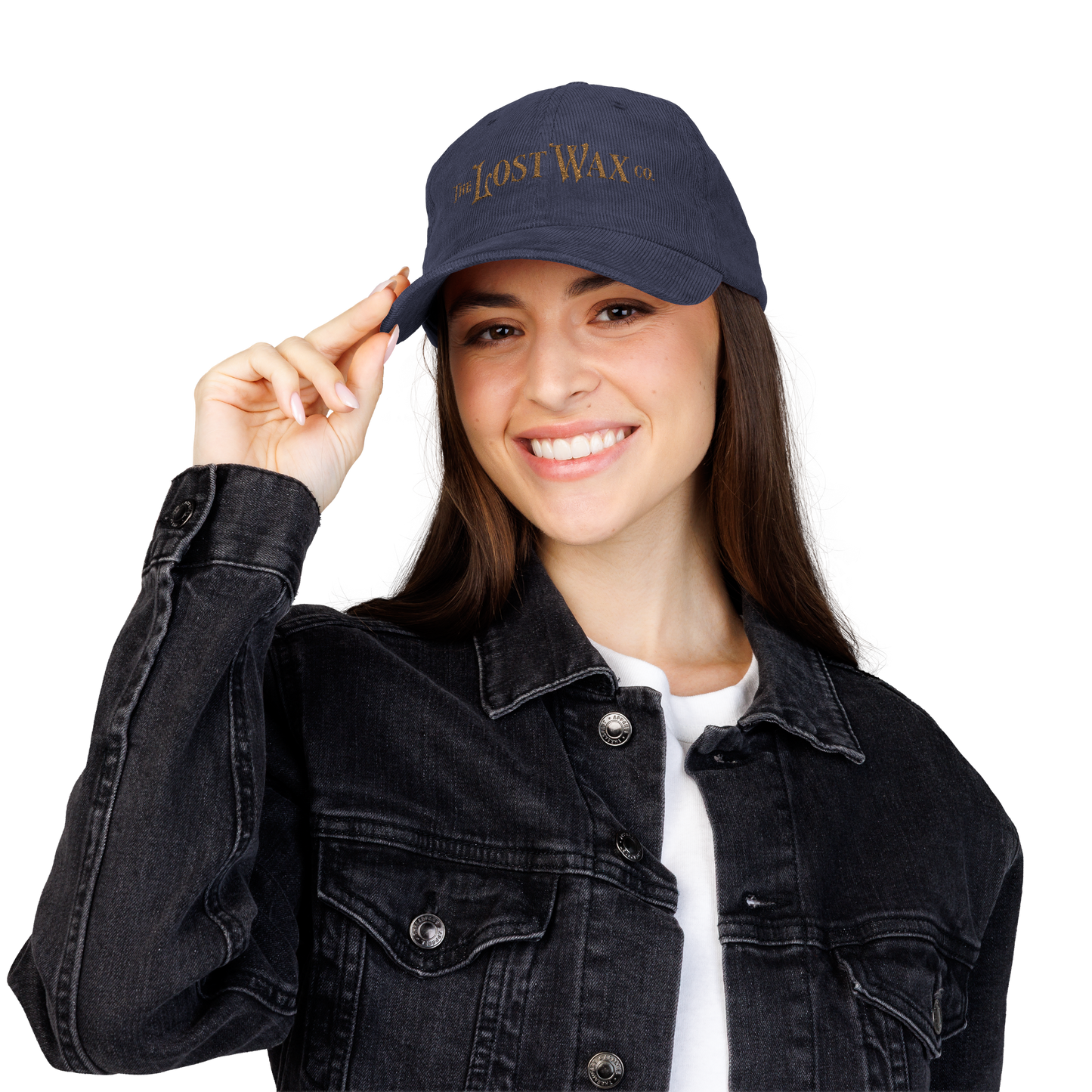 Woman wearing a navy blue cap with 'Lost Wax' logo on a white background