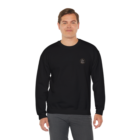 Man wearing a black sweatshirt with a logo on a white background