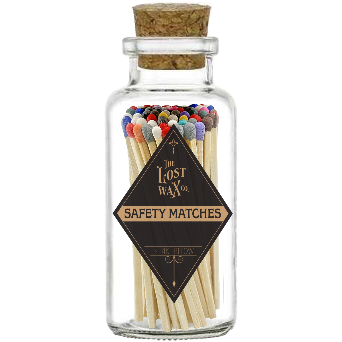 Glass jar with cork lid containing colorful safety matches from The Lost Wax Co.