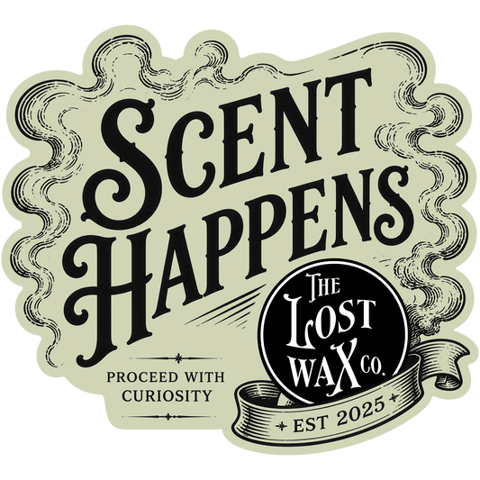 Logo of 'The Lost Wax Co.' with text 'Scent Happens' and 'Proceed with Curiosity'.