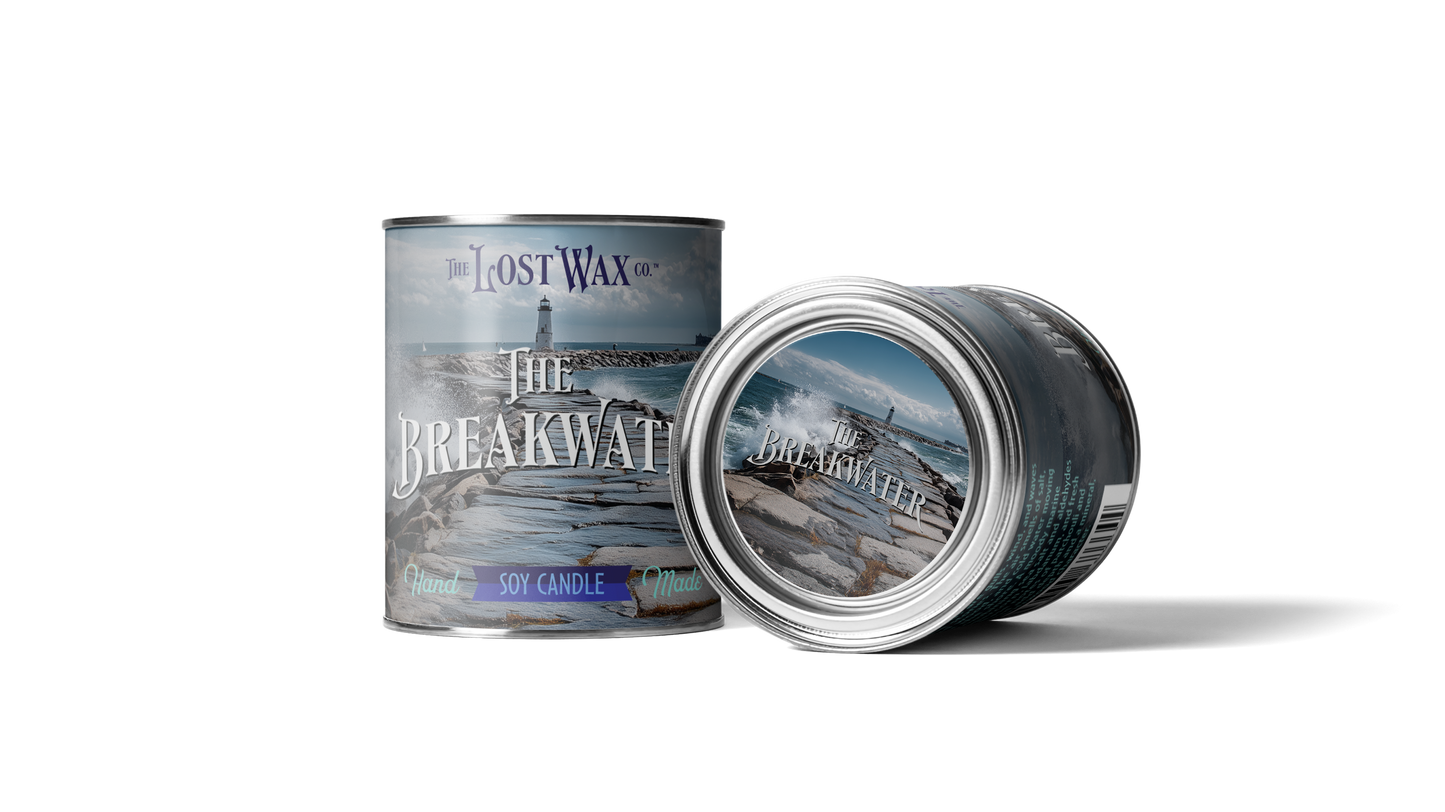 Two cans of 'The Lost Wax' Breakwater candle on a white background