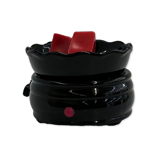 Black ceramic wax warmer on a white background