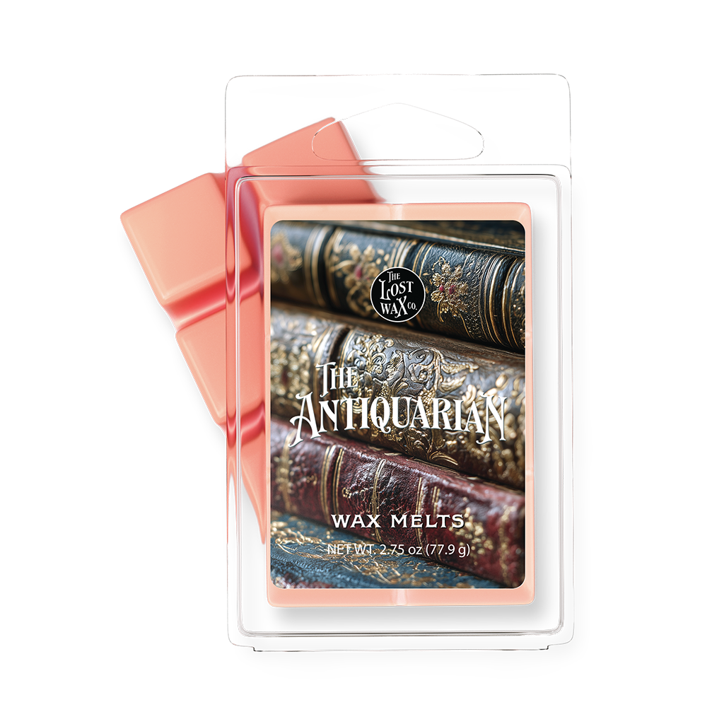 Wax Melt package with 'The Antiquarian' design featuring stacked books on a white background