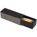 Black matchbox with honeycomb pattern and matches inside on a white background