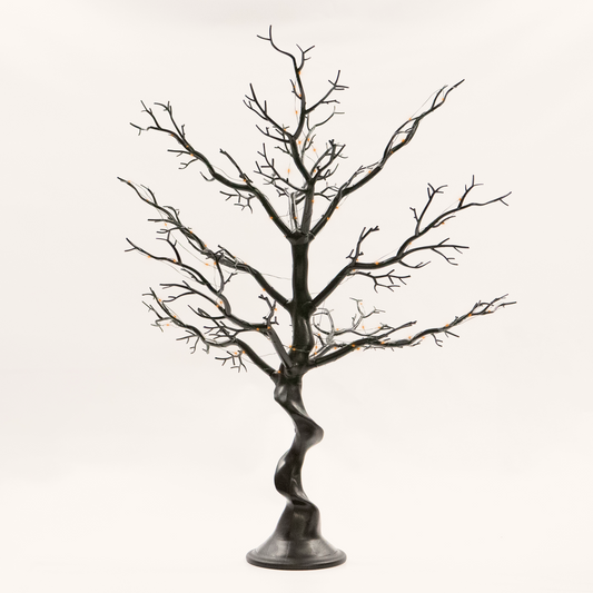 Decorative black tree with bare branches on a white background