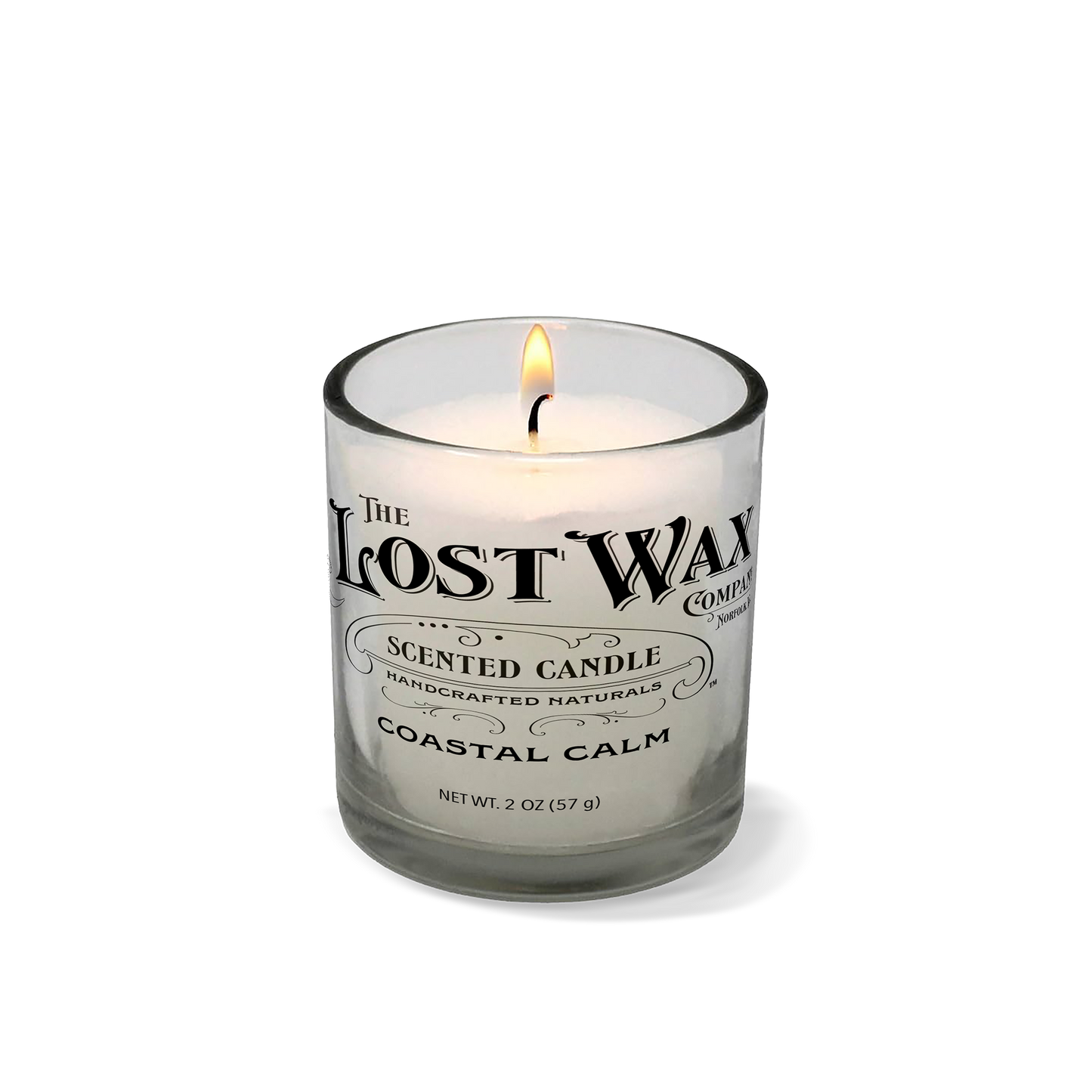 Coastal Calm scented candle in a glass container with 'The Lost Wax Company' branding on a white background