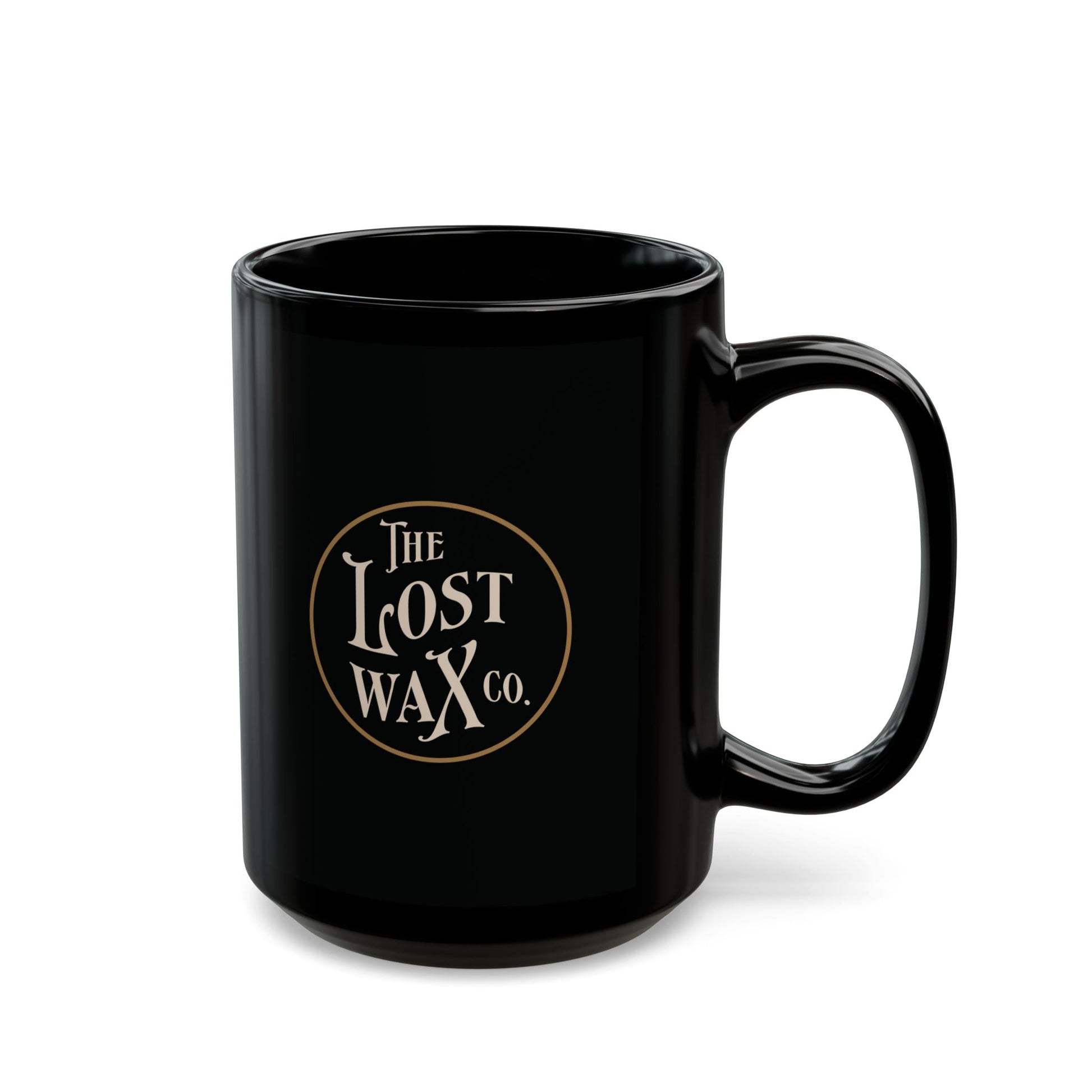 Black mug with 'The Lost Wax Co.' logo on a white background
