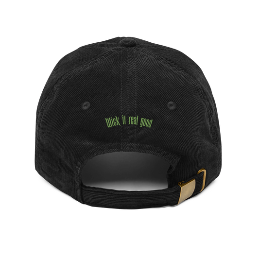 Black cap with 'Wick it real good' text on the back against a white background