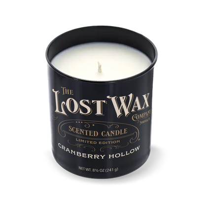 Cranberry Hollow scented candle in a black container with 'The Lost Wax Company' branding on a white background