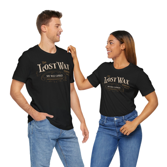 Two people wearing black t-shirts with 'The Lost Wax Company' logo on a white background