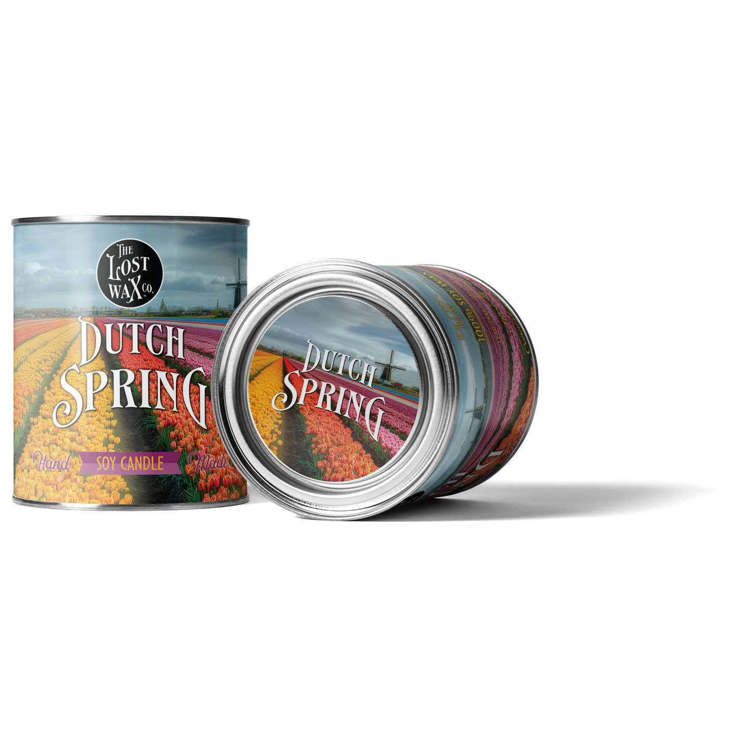 Two cans of 'Dutch Spring' candles by The Lost Wax Co. on a white background