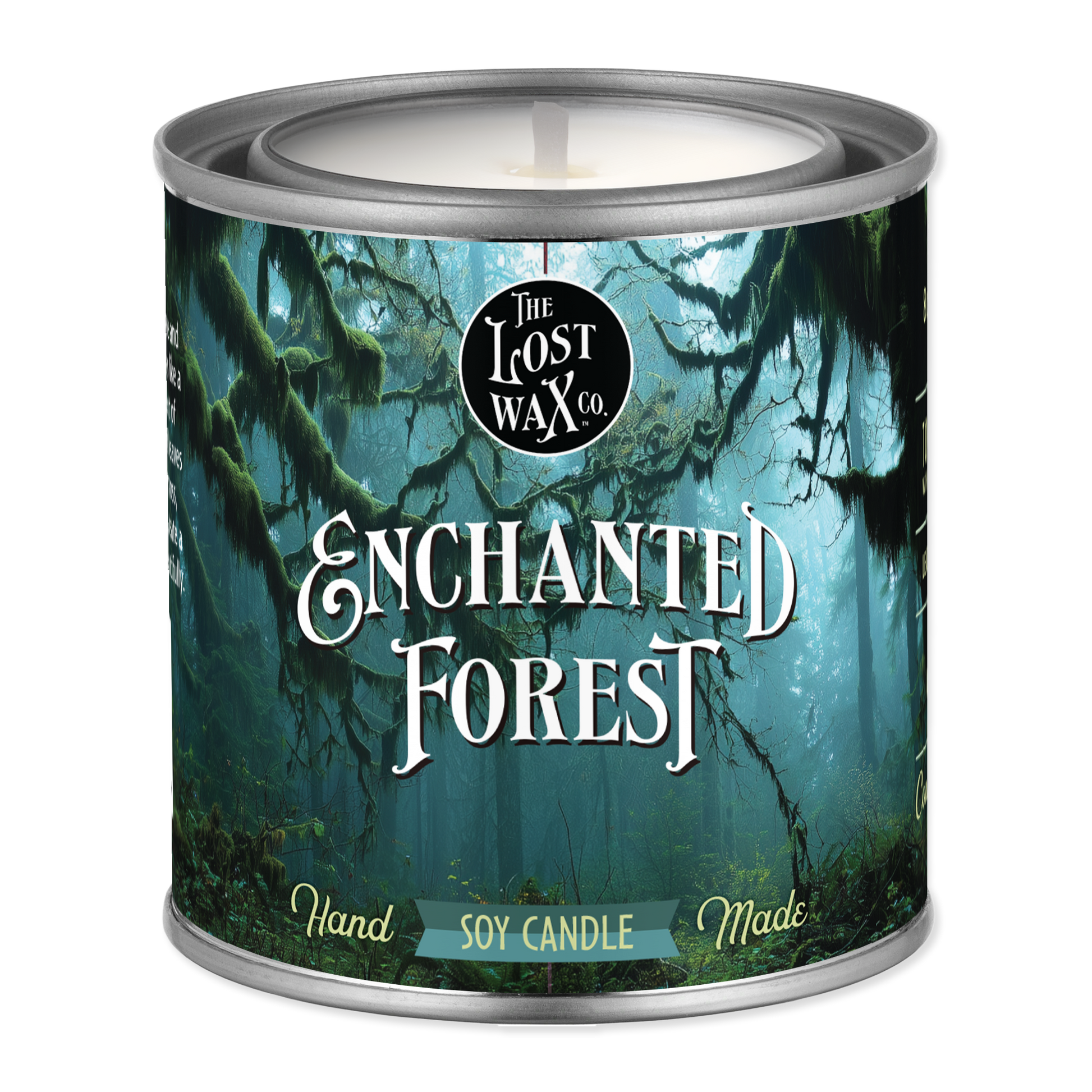Candle in a can labeled 'Enchanted Forest' by The Lost Wax Co.