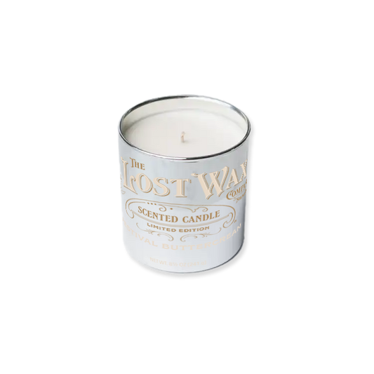 Scented candle in a tin with 'The Lost Wax Company' branding on a white background