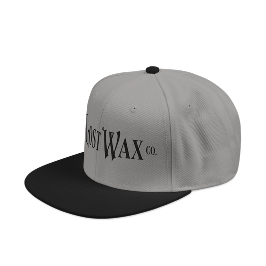 Gray and black cap with 'Lost Wax Co.' logo on a white background