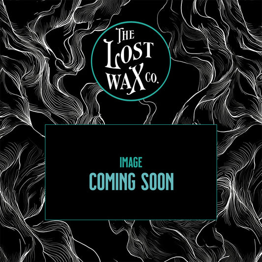 A black placeholder graphic with white abstract line art and a teal circular logo reading 'The Lost Wax Co.' at the top, plus a central black box with the text 'IMAGE COMING SOON' in teal.