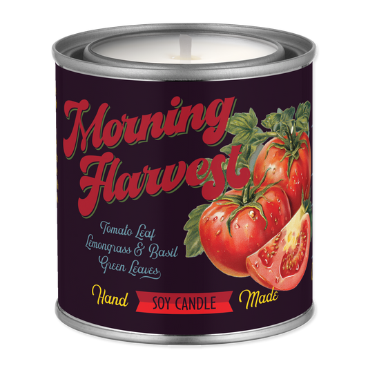 Candle tin labeled 'Morning Harvest' with tomato design on a white background