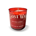 Red candle with 'The Lost Wax Company' branding on a white background