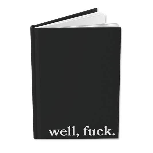 Black notebook with 'well, fuck.' text on a white background