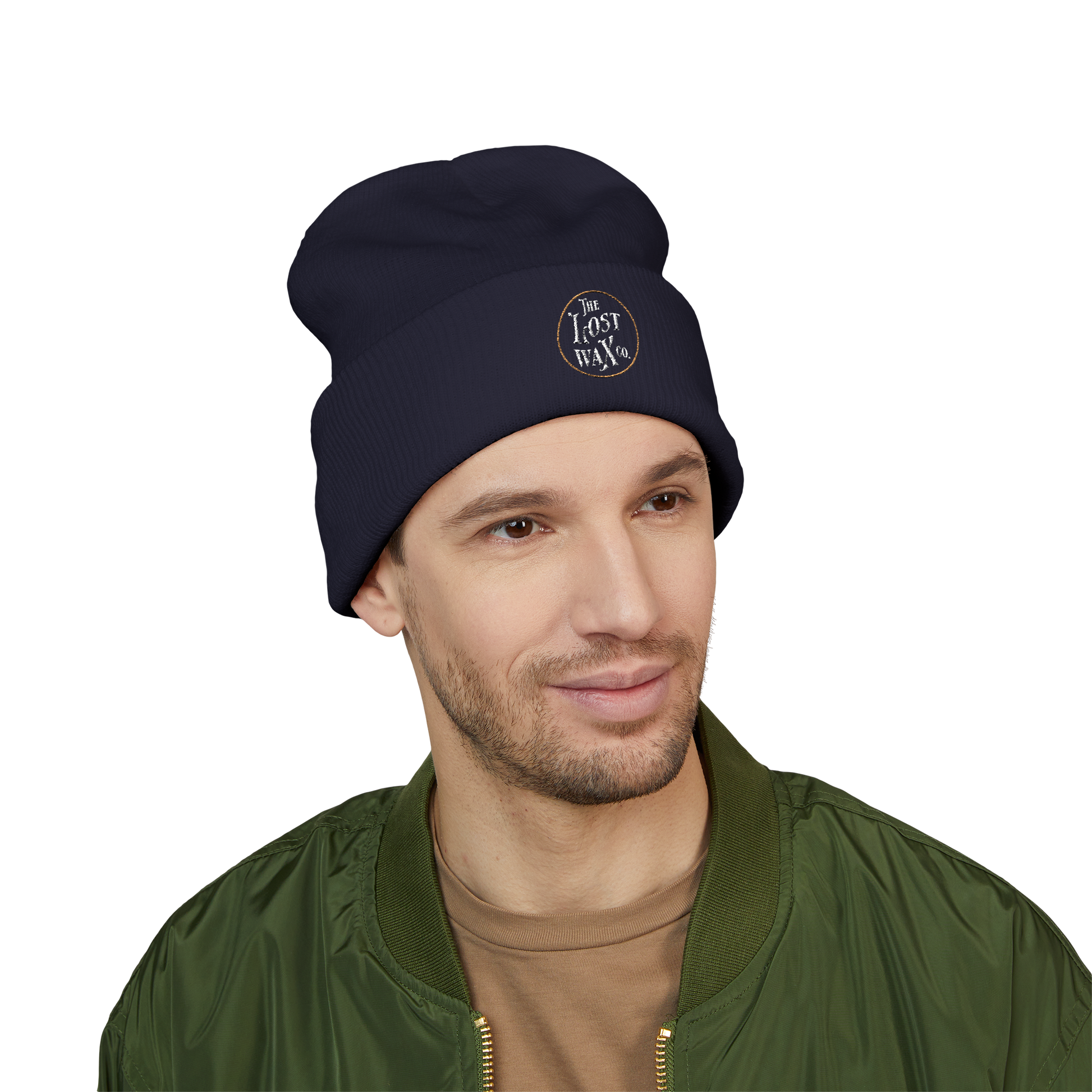 Man wearing a navy beanie with a logo on a white background