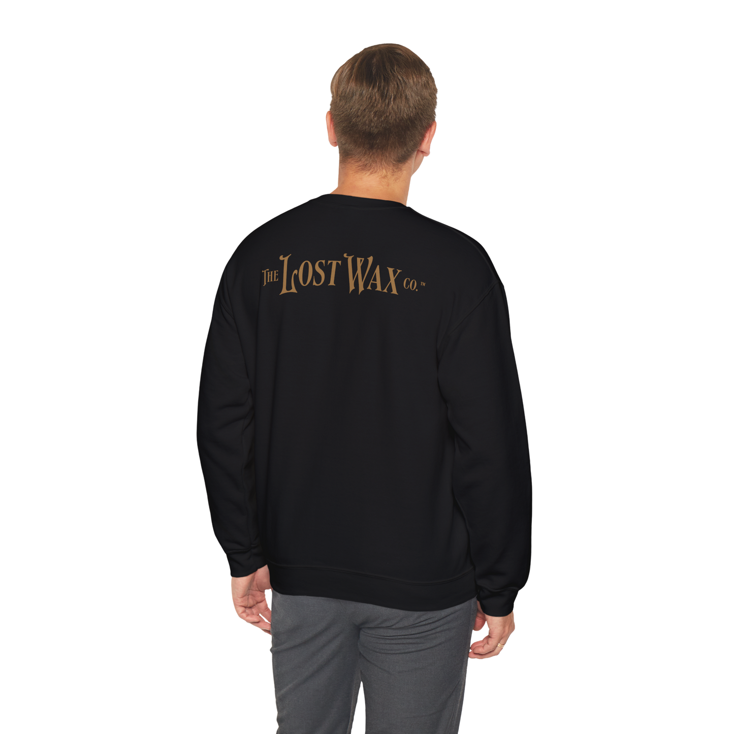 Person wearing a black sweatshirt with 'The Lost Wax Co.' logo on the back, standing against a white background.