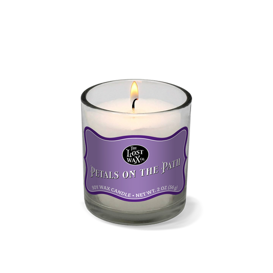 Candle with a purple label on a white background