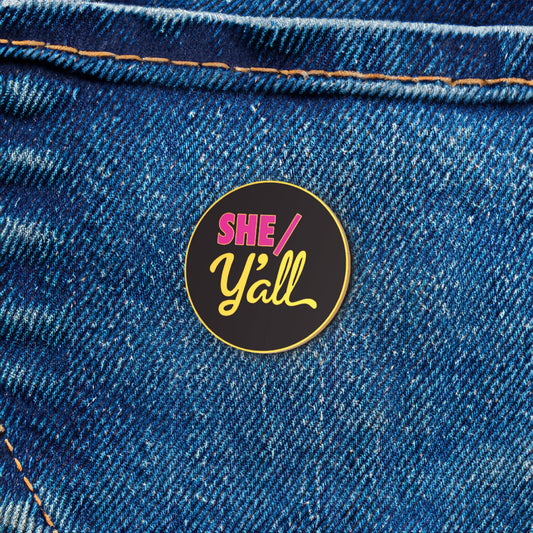 Denim jacket with a 'SHE/Y'all' badge