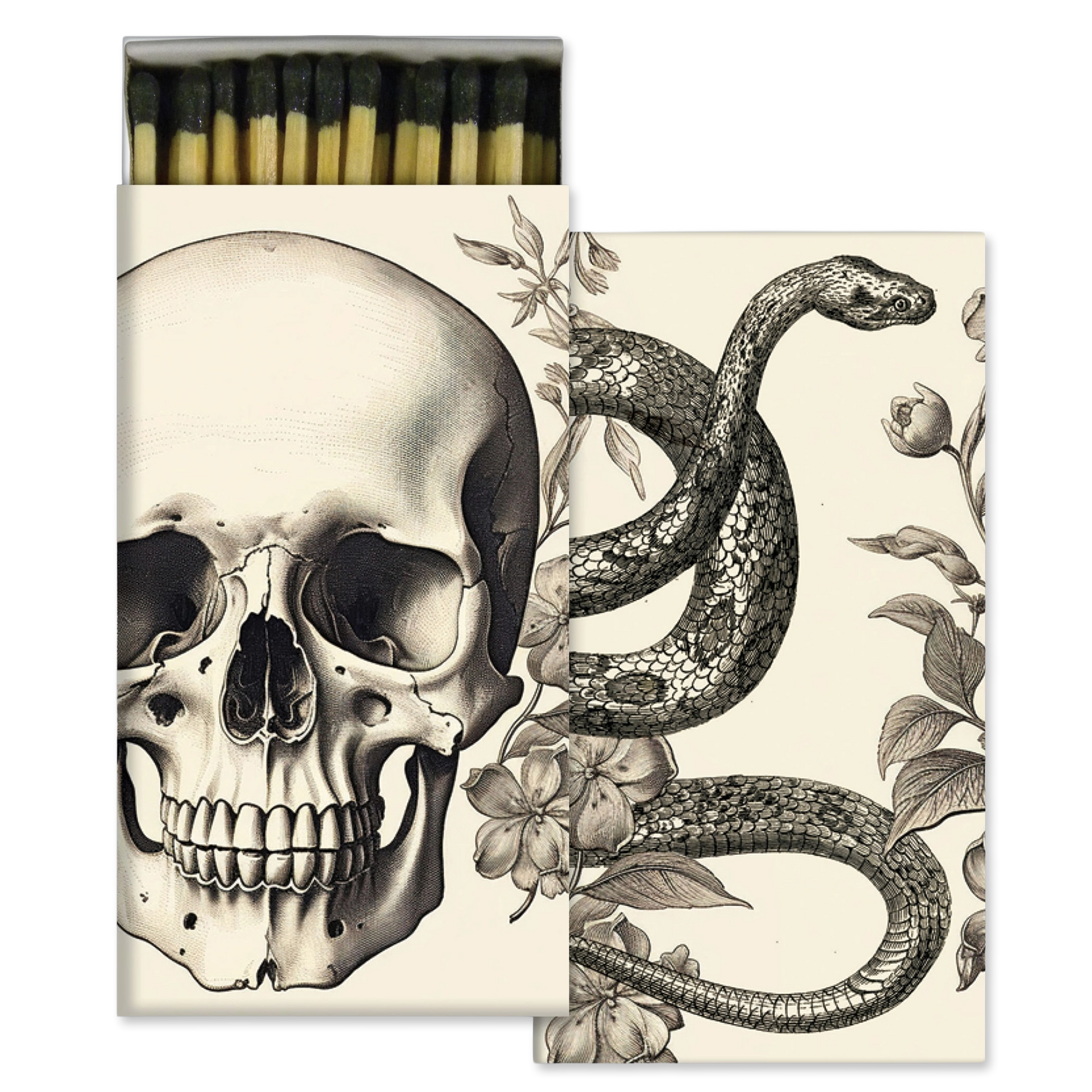 A matchbox-style match set with illustrated packaging: one box face shows a large skull, the other shows a coiled snake among flowers, and the top row of matches has black heads with pale yellow handles. No person, animal, or real environment is present, so this is Product/Packaging.