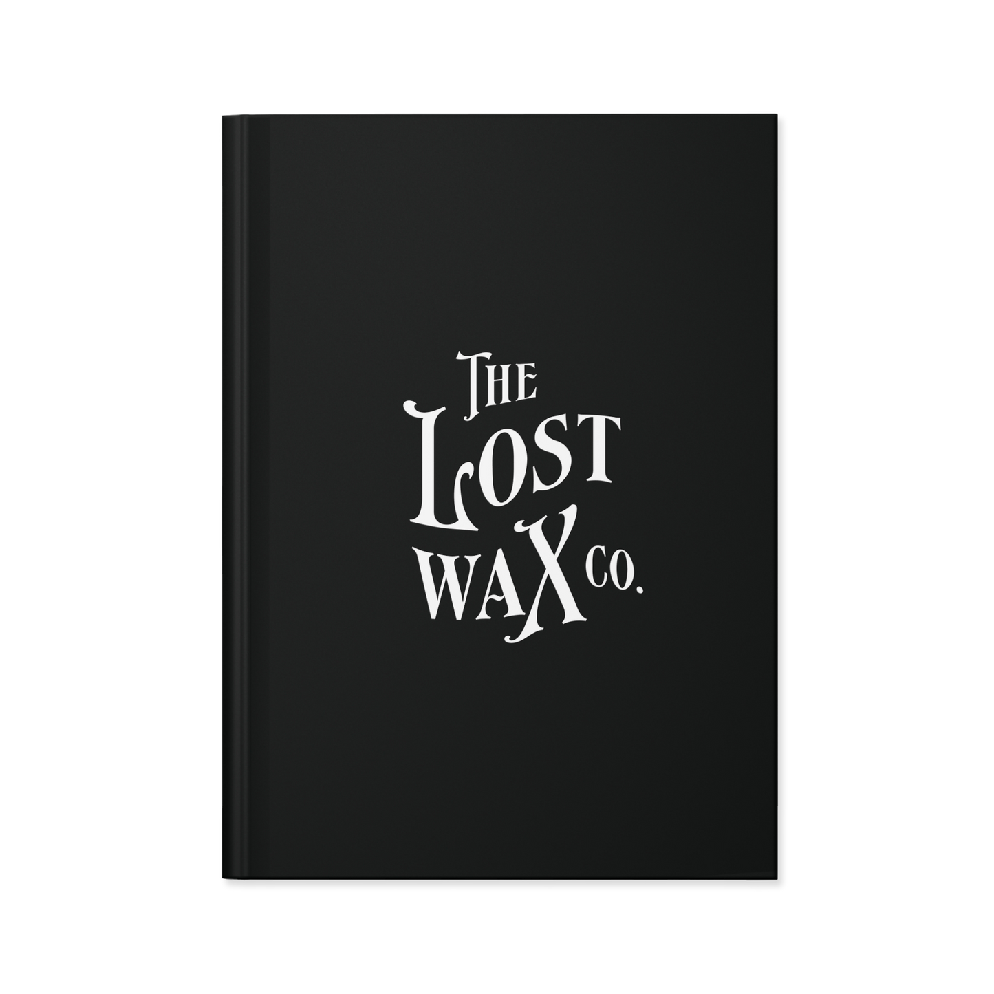 Black notebook with 'The Lost Wax Co.' logo on a white background