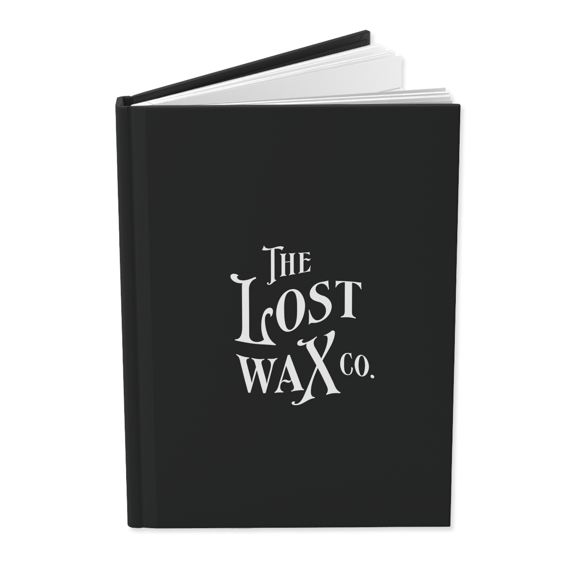 Black book with 'The Lost Wax Co.' logo on a white background