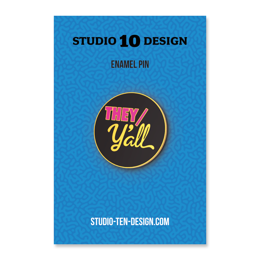 Enamel pin packaging with 'THEY/ Y'ALL' design on a blue background