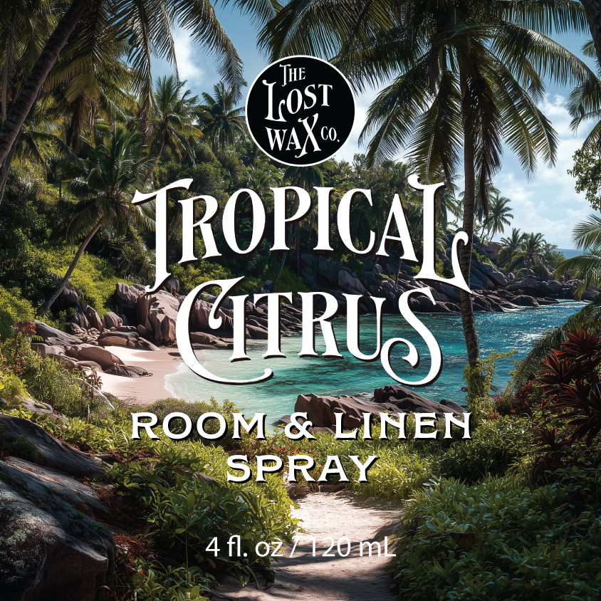 Tropical scenery with palm trees and ocean, featuring 'The Lost Wax Co. Tropical Citrus' room & linen spray advertisement.