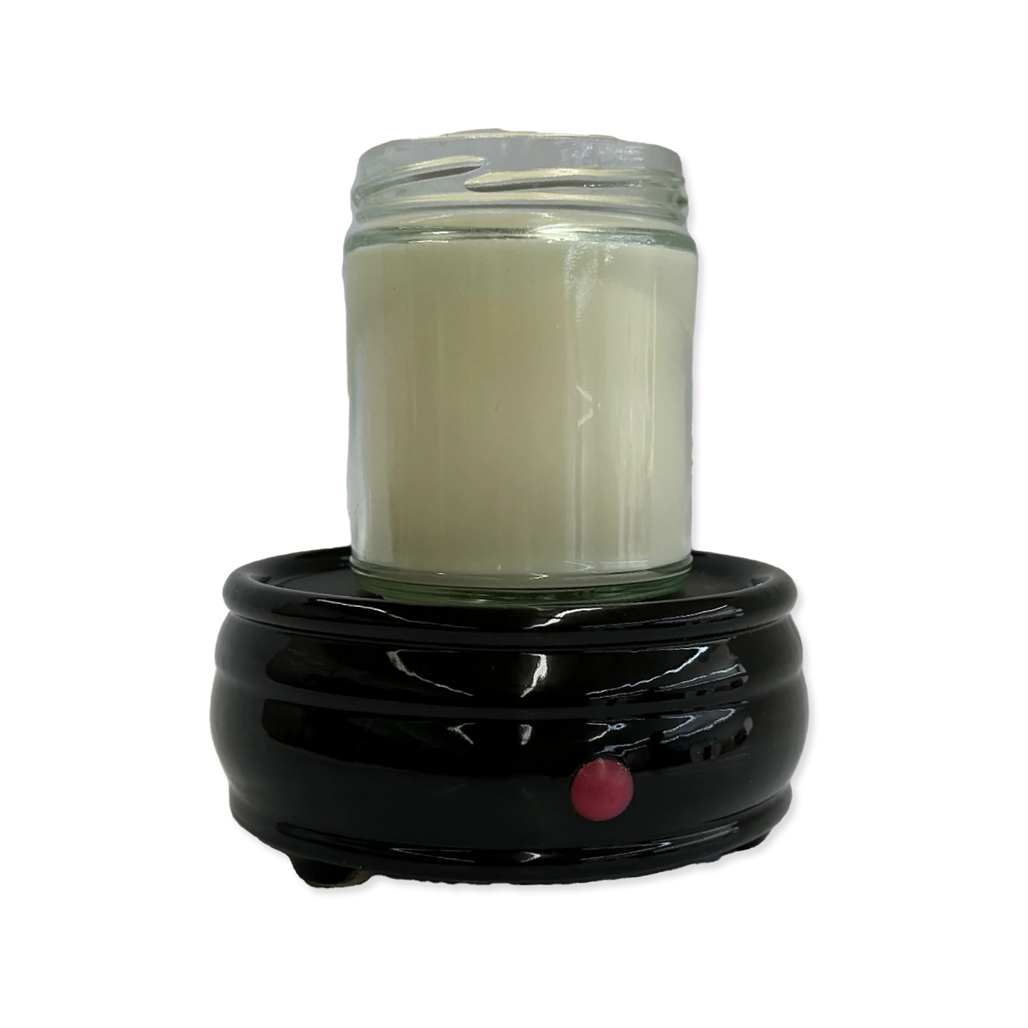 Candle warmer with a glass candle on a white background