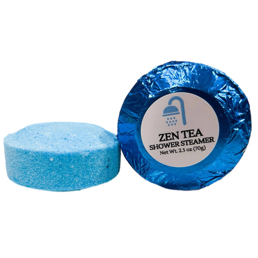 Blue shower steamer with packaging on a white background