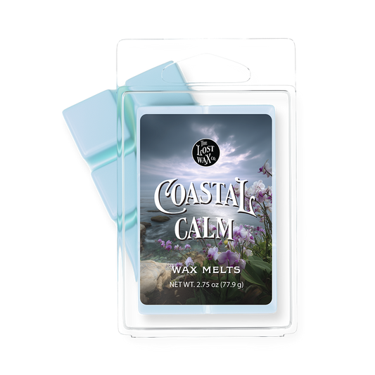 Card with 'Coastal Calm' design featuring a beach scene and flowers, with a clear plastic cover.