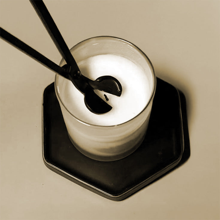 Trimming a candle wick to ¼ inch before burning is essential.